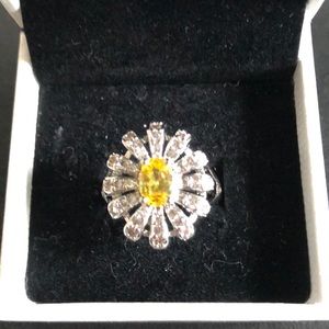 Elegant Silver and Yellow Gemstone Ring